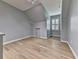 Bonus room features vaulted ceiling, hardwood floors, and neutral decor at 2347 Univeter Rd, Canton, GA 30115