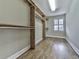Walk-in closet features custom shelving and hardwood floors at 2347 Univeter Rd, Canton, GA 30115