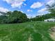 A wide, open field provides a sense of tranquility and space, ideal for outdoor activities and enjoying nature's beauty at 2347 Univeter Rd, Canton, GA 30115