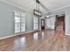 Spacious living room with hardwood floors, large windows and plenty of natural light at 2347 Univeter Rd, Canton, GA 30115