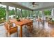 Sunroom with tile floors, floor to ceiling windows, and furniture at 2347 Univeter Rd, Canton, GA 30115