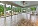 Sunroom with floor to ceiling windows and tile floors at 2347 Univeter Rd, Canton, GA 30115