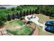 Community dog park and seating area with fire pit and manicured landscaping at 360 Niles Ct, Marietta, GA 30060