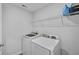 Laundry room featuring a washer and dryer with wire shelving at 360 Niles Ct, Marietta, GA 30060