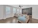 Bright living room featuring hardwood floors, neutral furniture, and large windows with natural light at 360 Niles Ct, Marietta, GA 30060