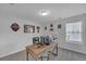 Home office with a vintage desk, neutral walls, and carpeted floor at 360 Niles Ct, Marietta, GA 30060