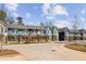 Community street view showcasing modern townhomes with inviting curb appeal at 1095 Tucker Ave # 503, Atlanta, GA 30310