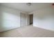 Neutral bedroom with carpet and two doors, offering versatility for bedroom or office at 1800 Forkview Ct, Lawrenceville, GA 30044