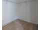 A walk-in closet with carpet floors and wire shelving racks along the top at 1800 Forkview Ct, Lawrenceville, GA 30044