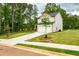 Two-story home with a well-manicured front yard and a paved driveway at 1800 Forkview Ct, Lawrenceville, GA 30044
