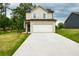 Charming two-story home with a spacious two-car garage and well-maintained lawn at 1800 Forkview Ct, Lawrenceville, GA 30044