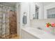 Bathroom features shower with curtain, vanity, mirror and window at 3501 Montreal Way, Tucker, GA 30084