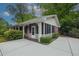 Charming brick house with a screened-in porch and manicured landscaping for curb appeal at 3501 Montreal Way, Tucker, GA 30084