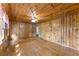 Living room features wood-paneled walls, hardwood floors, and natural light at 618 Buchanan Hwy, Dallas, GA 30157