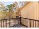 Wooden back deck overlooking trees with fall foliage at 7840 Highway 101, Rockmart, GA 30153