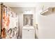 Bright bathroom featuring a floral shower curtain and a vanity with counter space at 7840 Highway 101, Rockmart, GA 30153