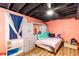 Cozy bedroom features wood floors, ample storage, and a ceiling fan at 7840 Highway 101, Rockmart, GA 30153