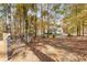 Private tree-lined driveway leading to a secluded home, offering peace and tranquility at 7840 Highway 101, Rockmart, GA 30153