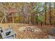 Inviting backyard fire pit area with seating, ideal for outdoor gatherings and relaxation at 7840 Highway 101, Rockmart, GA 30153