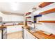 Bright kitchen featuring wood countertops, white cabinets, and stainless steel appliances at 7840 Highway 101, Rockmart, GA 30153