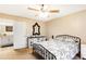 Tranquil main bedroom with a ceiling fan, en-suite bathroom, and plenty of space at 7840 Highway 101, Rockmart, GA 30153