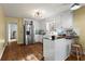 Bright kitchen with modern appliances, wood countertops, white cabinetry and hardwood floors at 1925 Commonwealth Ct, Cumming, GA 30041