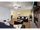 Comfortable living room with hardwood floors, a fireplace, and an open floor plan at 1925 Commonwealth Ct, Cumming, GA 30041