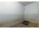 Tiled dog room offering easy cleaning and two dog beds for added comfort at 225 Nacoochee Dr, Woodstock, GA 30188