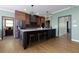 Charming kitchen featuring a granite island, stainless steel appliances, and modern cabinetry at 225 Nacoochee Dr, Woodstock, GA 30188