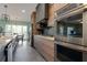 Updated kitchen with stainless steel appliances, modern cabinetry and a long island at 225 Nacoochee Dr, Woodstock, GA 30188