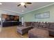 Open floor plan with view of the kitchen from the living room with hardwood floors at 225 Nacoochee Dr, Woodstock, GA 30188