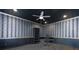 Office space with decorative wall paneling, built-in shelving, and sleek desk for a productive workspace at 225 Nacoochee Dr, Woodstock, GA 30188