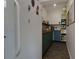 A view of the pantry with blue cabinets, wooden countertop and shelving at 225 Nacoochee Dr, Woodstock, GA 30188