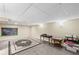 Basement with carpet flooring, tan walls and black chalkboard at 24 Picketts Mill Pl, Acworth, GA 30101