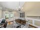 Lovely dining area with a stylish chandelier and a view of the outdoor patio at 24 Picketts Mill Pl, Acworth, GA 30101