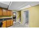Kitchen with tile floors, wood cabinets and yellow walls at 24 Picketts Mill Pl, Acworth, GA 30101