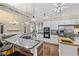 Bright kitchen with granite countertops, stainless steel appliances, and a breakfast bar with seating at 24 Picketts Mill Pl, Acworth, GA 30101