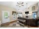 Inviting living area features a cozy fireplace, vaulted ceilings, and ample natural light at 24 Picketts Mill Pl, Acworth, GA 30101