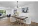 Bright dining room featuring a modern chandelier, stylish art, and comfortable seating at 3182 Wakefield Dr, Decatur, GA 30034
