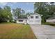 Beautiful home featuring a two-car garage and well-maintained front lawn with landscaping at 3182 Wakefield Dr, Decatur, GA 30034