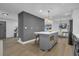 This kitchen features a center island, modern light fixtures, and gray cabinets at 3182 Wakefield Dr, Decatur, GA 30034
