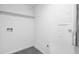 Small laundry room with utility connections at 3182 Wakefield Dr, Decatur, GA 30034