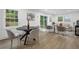 Charming living room with a round table, plush seating, and sliding glass doors to the exterior at 3182 Wakefield Dr, Decatur, GA 30034