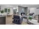 Bright and open living space flowing into the dining area and featuring modern finishes at 3182 Wakefield Dr, Decatur, GA 30034