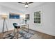 Bright home office features desk, lamps, and picture window at 3182 Wakefield Dr, Decatur, GA 30034