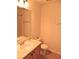 Bright bathroom featuring a vanity with sink, toilet, and a shower-tub combination for comfort at 615 Magnolia Gardens Walk, Mcdonough, GA 30253
