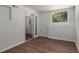 Room features wood-look flooring and a large window at 651 Deer Oaks Dr, Lawrenceville, GA 30044
