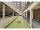 Well-maintained dog park area with artificial turf and convenient covered parking at 800 Peachtree Ne St # 2304, Atlanta, GA 30308
