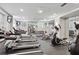 Community fitness center with modern exercise equipment and mirrored walls at 800 Peachtree Ne St # 2304, Atlanta, GA 30308