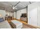 Inviting living area with hardwood floors, open to the dining area and kitchen, bathed in natural light at 800 Peachtree Ne St # 2304, Atlanta, GA 30308